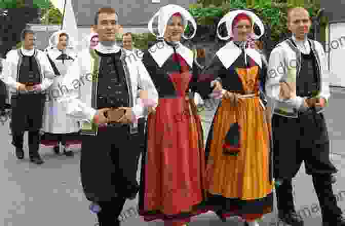 A Colorful Parade With People In Traditional French Costumes, Showcasing The Rich And Diverse Traditions Of France Culture Wise France Joe Laredo