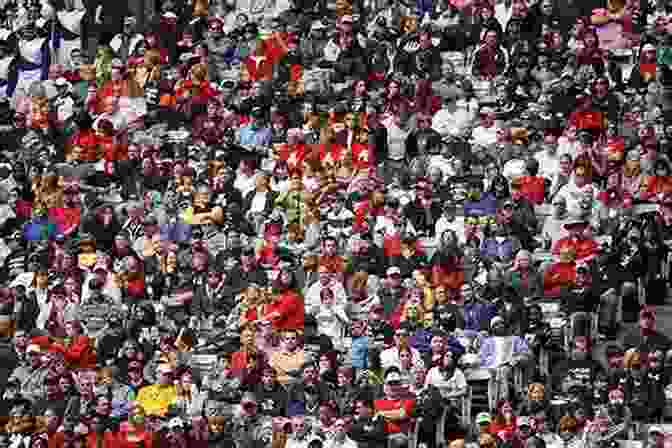 A Packed Stadium Filled With Cheering Fans At A High School Football Game. High School Football In South Carolina: Palmetto Pigskin History (Sports)