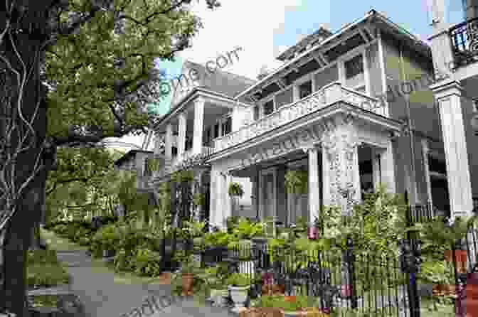 Panoramic View Of The Garden District Of New Orleans With Lush Greenery, Opulent Mansions, And Historic Landmarks The Garden District Of New Orleans